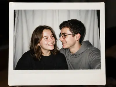 Take a photo with a Polaroid camera. The photo should look like an ordinary snapshot, without any clear main subject or props. It should have a
