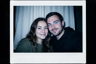 Take a picture with a Polaroid camera. The photo should look like a normal photo, without any clear subjects or props. The photo should have a slight