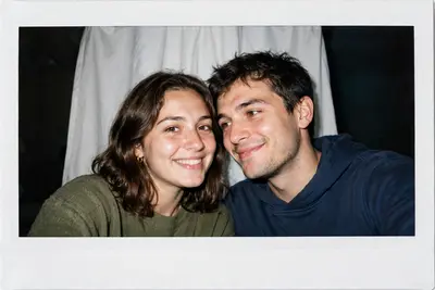 A photo taken with a Polaroid camera. The photo should look like an ordinary snapshot, without any clear main subject or props. It should have a