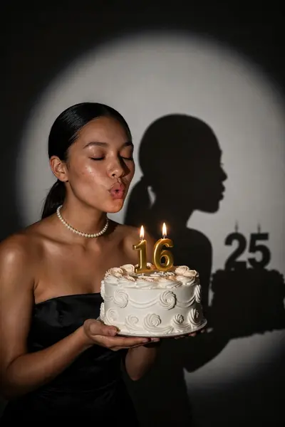 ULTRA REALISTIC PORTRAIT, A YOUNG WOMAN WITH MEDIUM SKIN TONE AND SLEEK, STRAIGHT BLACK HAIR TIED BACK IN A LOW PONYTAIL. SHE IS WEARING A STRAPLESS