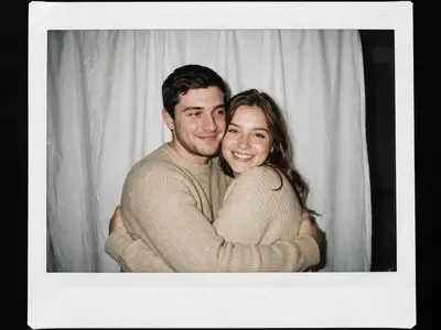 Take a photo with a Polaroid camera. The photo should look like a normal snapshot, without any clear main subject or props. It should have a slight