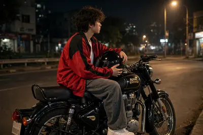 A REALISTIC OUTDOOR NIGHTTIME HANDHELD SMARTPHONE PHOTO, RANDOM CANDID AND UNPOSED, FEATURING THE BOY FROM THE UPLOADED IMAGE. HE IS SITTING SIDEWAYS