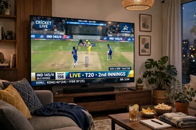 A screenshot from a live IPL cricket TV broadcast on Star Sports. The camera cuts to the audience our reference image person sitting in the crowd