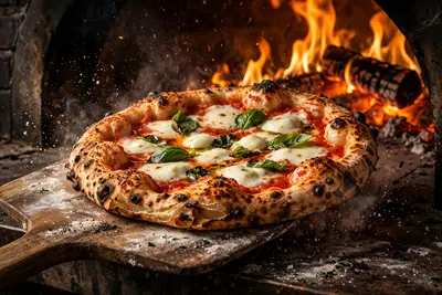 A blistered Neapolitan margherita pizza emerging from a wood-fired oven, flames licking behind, basil and buffalo mozzarella. Rustic food