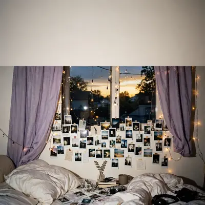 Square 1:1 album cover artwork: a bedroom window at dusk, lavender curtains, fairy lights, a Polaroid wall, pure bedroom pop energy. Raw flash-photo